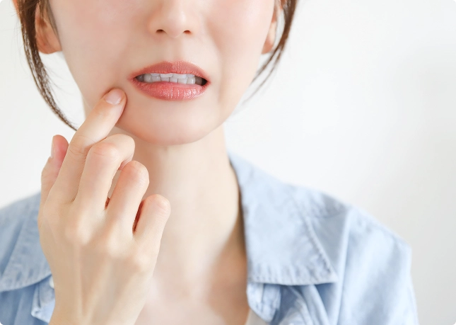 口角が下がる原因